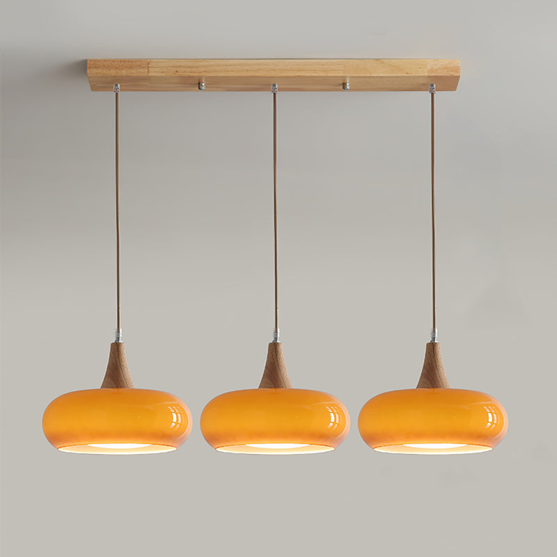 Lampada a sospensione in legno ambra