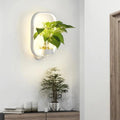 Lampada da parete con vaso per un'illuminazione verde e d'atmosfera