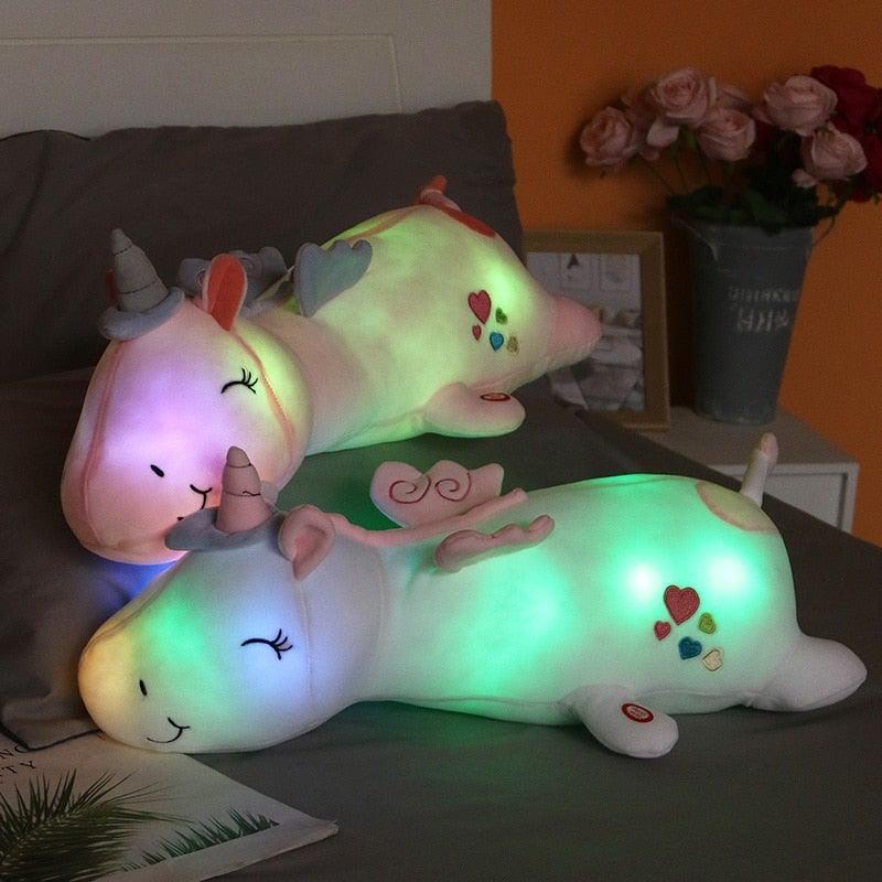 Giocattolo di peluche unicorno Lunacorn illuminato con LED arcobaleno per bambini