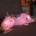 Giocattolo di peluche unicorno Lunacorn illuminato con LED arcobaleno per bambini