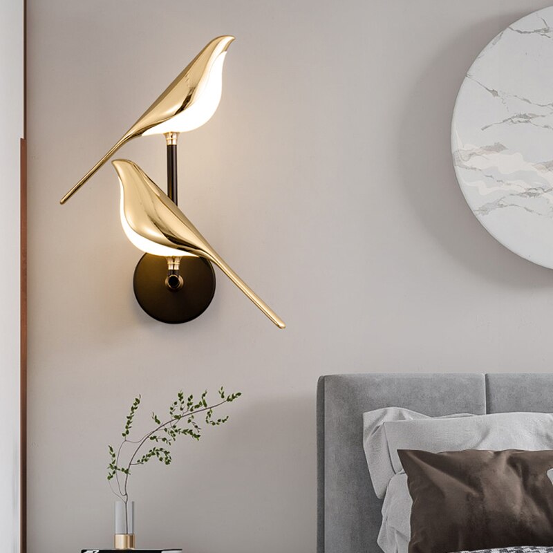 Moderna lampada da parete LED a forma di uccello