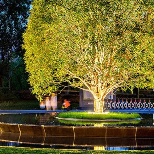 Valeris | Illuminazione LED per alberi con design a anello a terra da 360° e grado di protezione IP65 per giardini e paesaggi